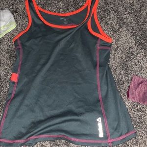 Grey and pink reebok tank top.